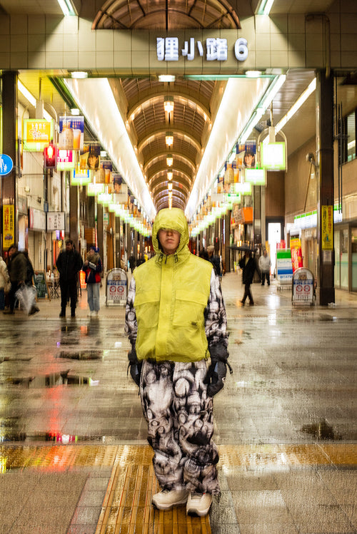 urban streetwear styling with wide snowboard pants, hoodie, and relaxed outerwear